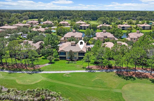 a view of a house with a big yard