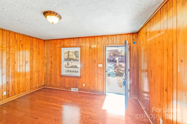 a view of an empty room and window