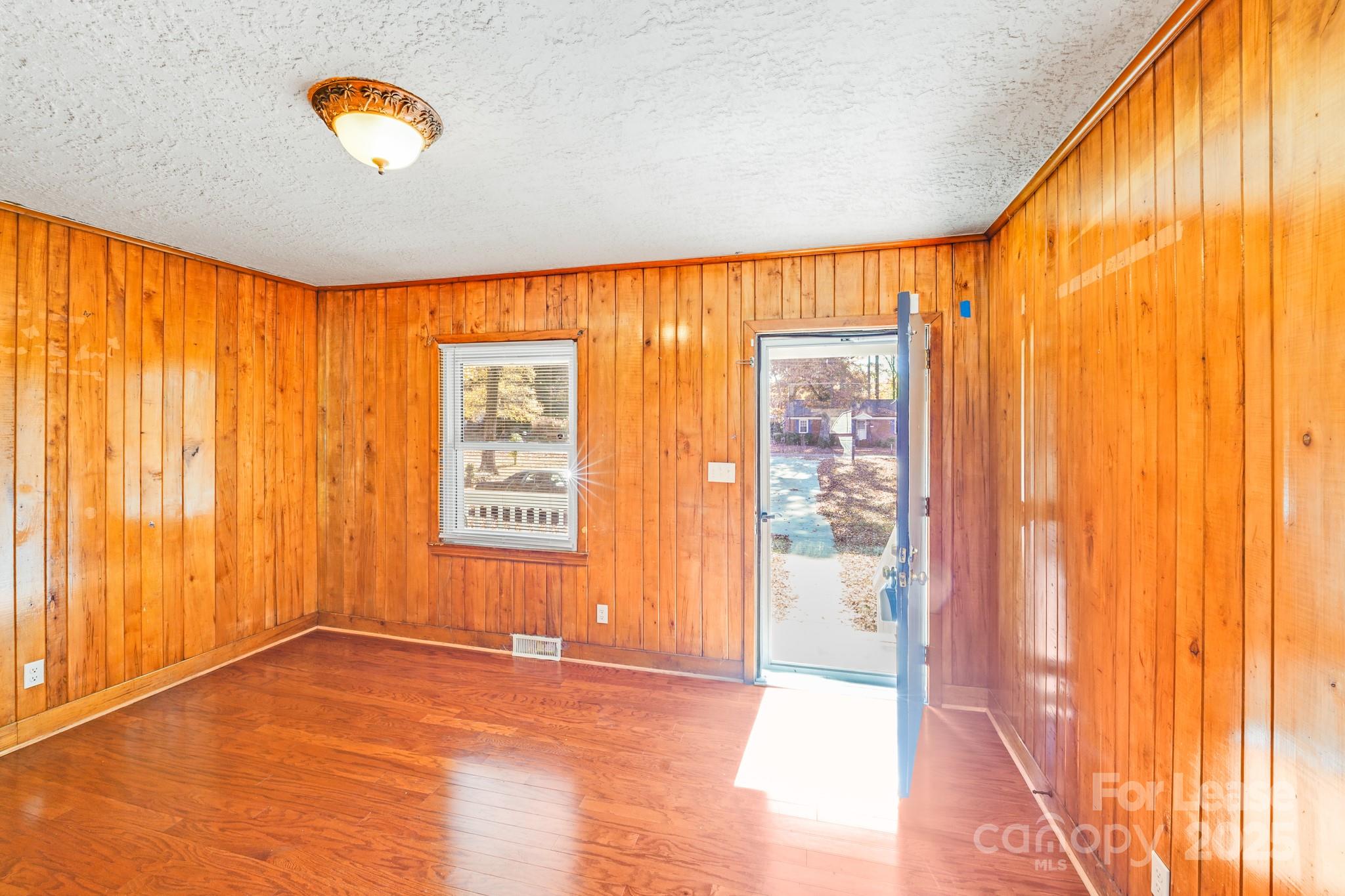 5311 Princess Street Charlotte, NC 28269 - Photo 9 of 24 a view of an empty room and window