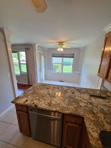 a room with a bed and a window