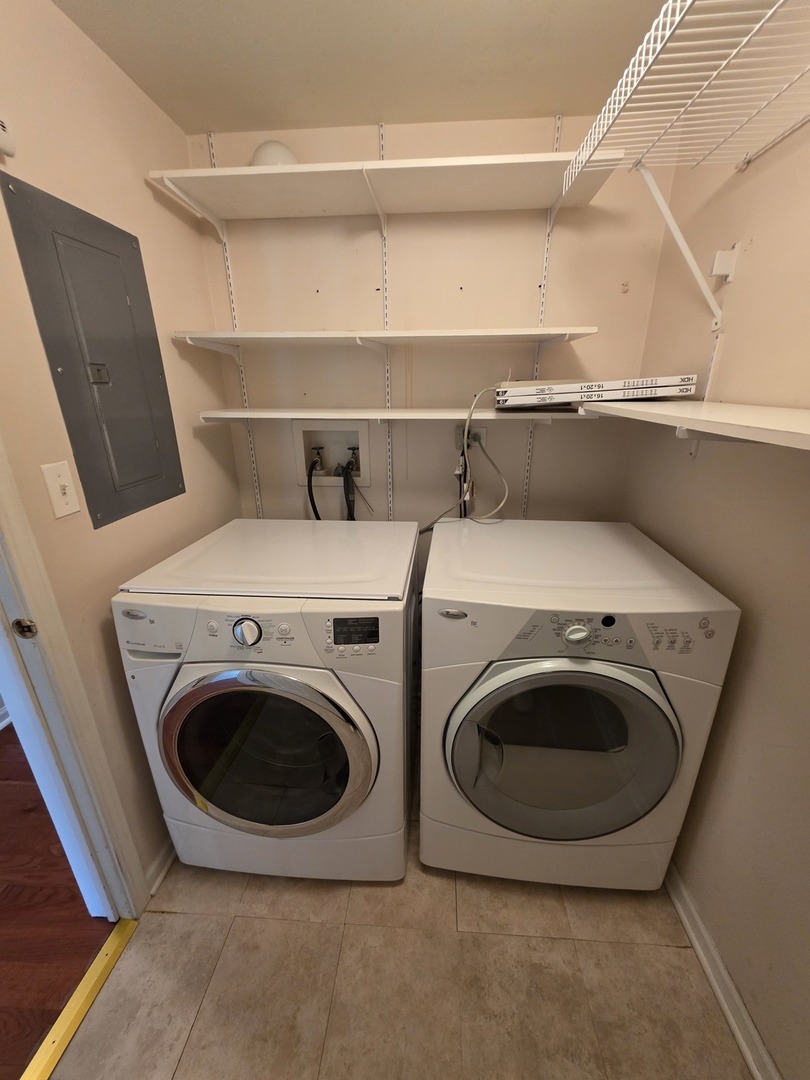 408 Woodview Circle, Unit B Elgin, IL 60120 - Photo 22 of 26 a utility room with dryer and washer