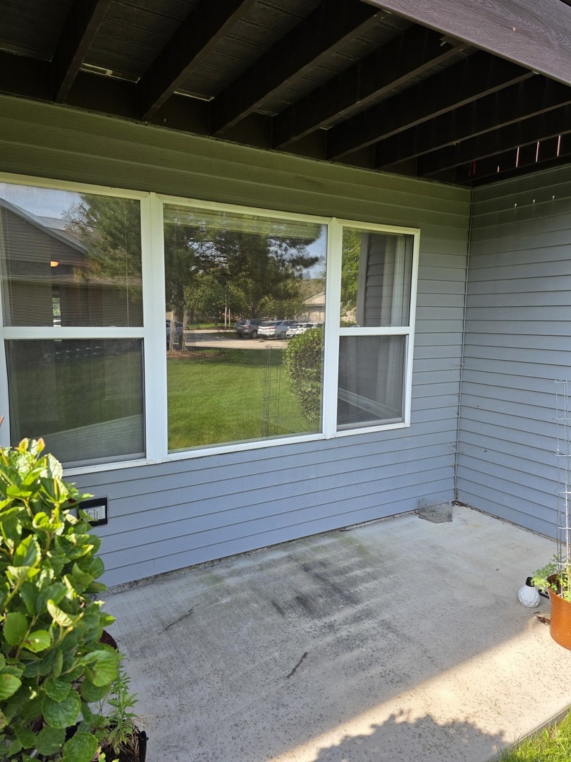 408 Woodview Circle, Unit B Elgin, IL 60120 - Photo 26 of 26 a view of a backyard with a garden