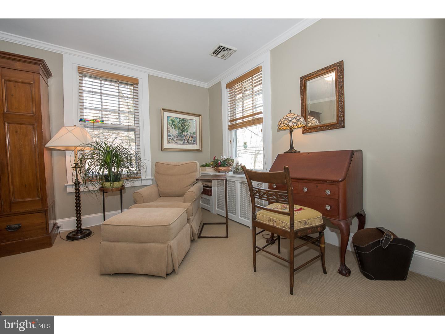 101 Glynn Lane Wayne, PA 19087 - Photo 15 of 25 a living room with furniture and a large window