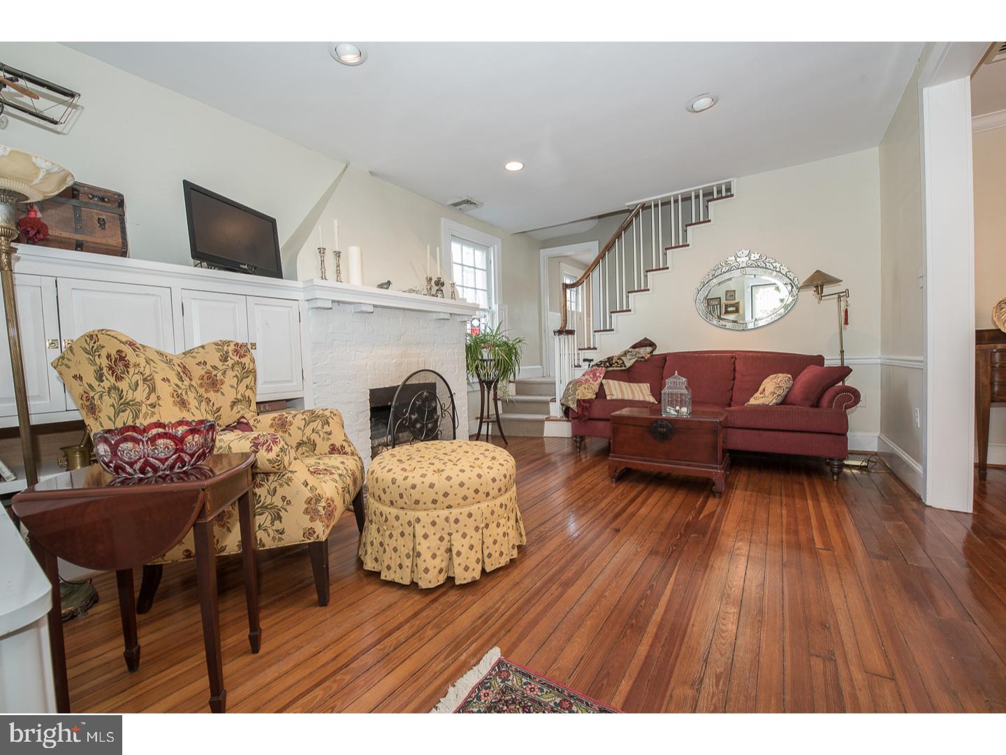 101 Glynn Lane Wayne, PA 19087 - Photo 3 of 25 a living room with furniture and a wooden floor