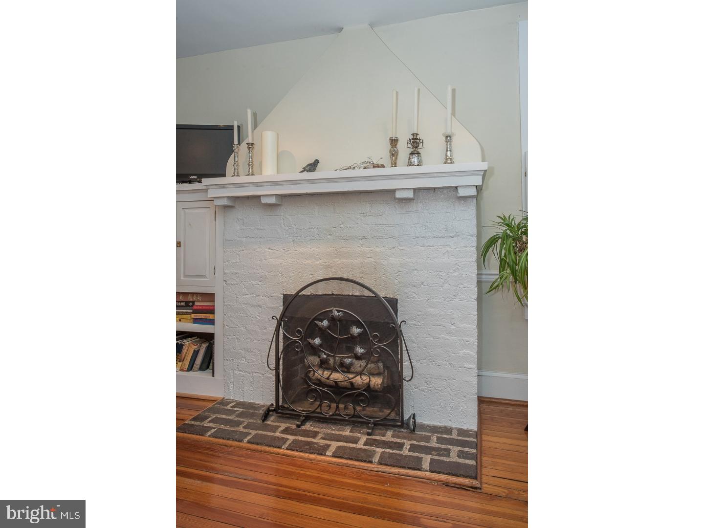 101 Glynn Lane Wayne, PA 19087 - Photo 6 of 25 a living room with a fireplace