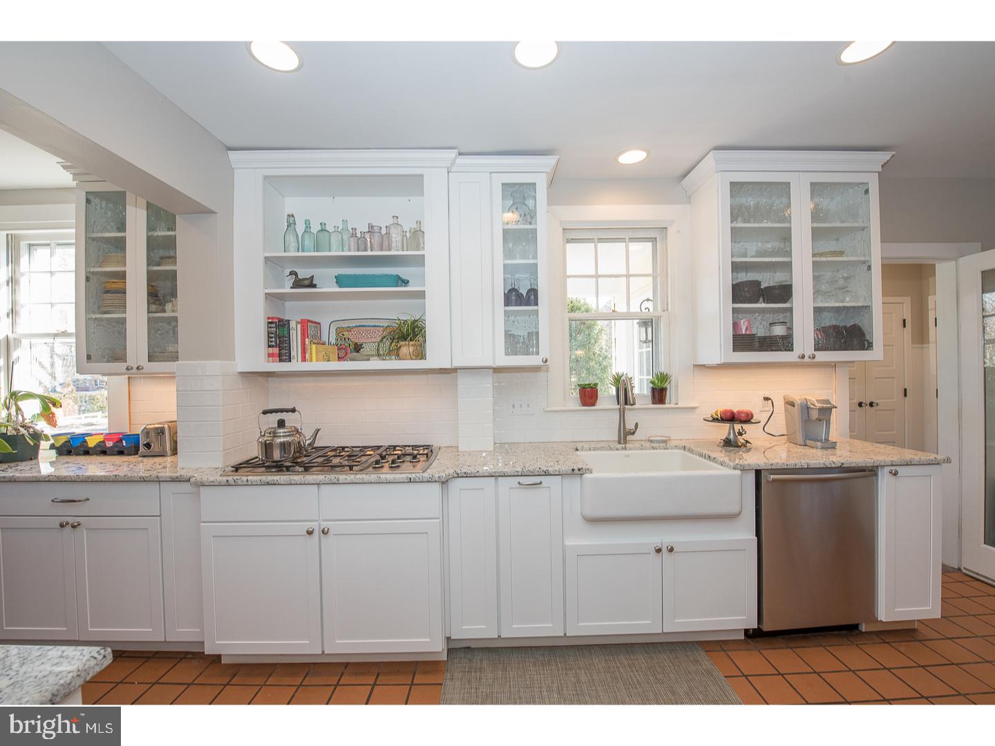101 Glynn Lane Wayne, PA 19087 - Photo 9 of 25 a kitchen with a sink cabinets and window
