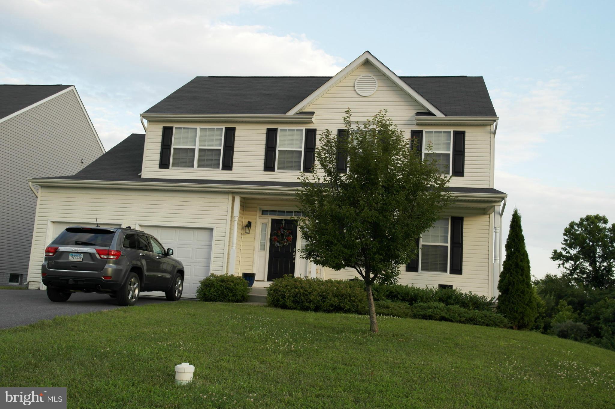 1702 Conrads Ferry Drive Point of Rocks, MD 21777 - Photo 1 of 29 a house view with a garden space