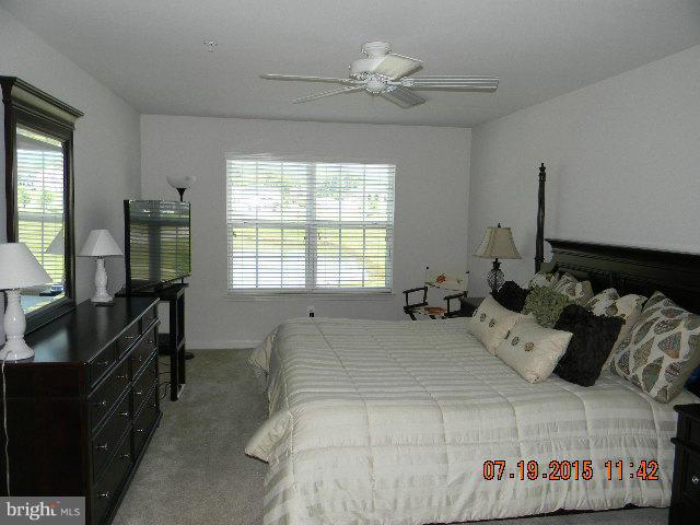 1702 Conrads Ferry Drive Point of Rocks, MD 21777 - Photo 16 of 29 a bedroom with a bed and a large window