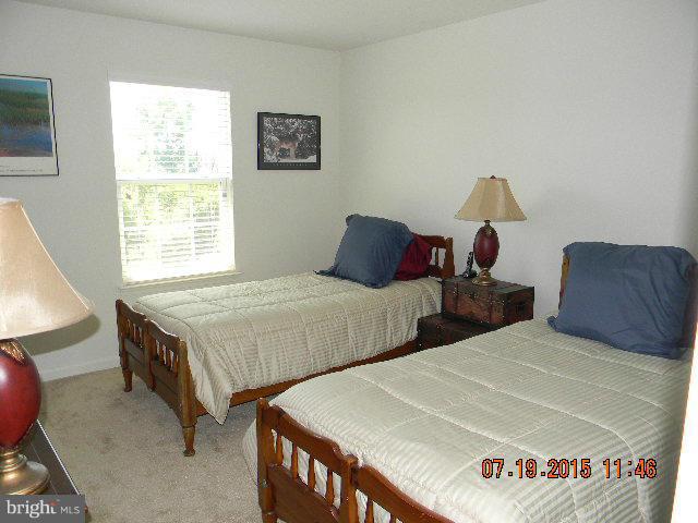 1702 Conrads Ferry Drive Point of Rocks, MD 21777 - Photo 19 of 29 a bedroom with two beds and a window