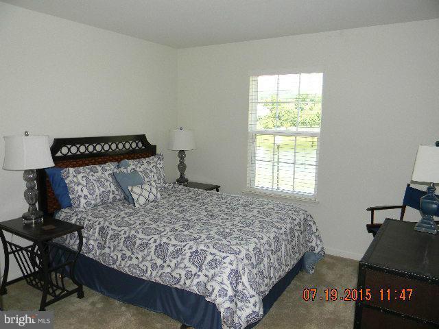1702 Conrads Ferry Drive Point of Rocks, MD 21777 - Photo 21 of 29 a bedroom with a bed and window