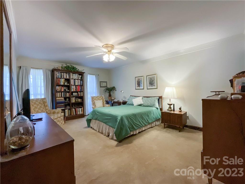 9523 Marvin School Road Marvin, NC 28173 - Photo 19 of 47 a bedroom with a bed and furniture