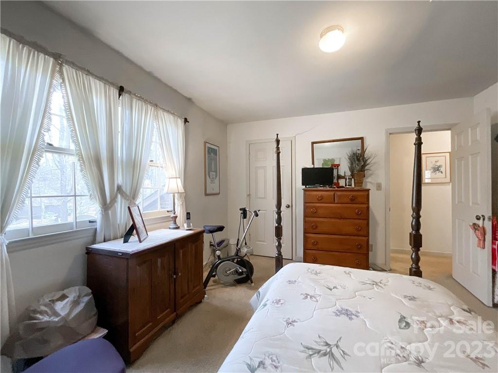9523 Marvin School Road Marvin, NC 28173 - Photo 29 of 47 a bedroom with a bed and a dresser
