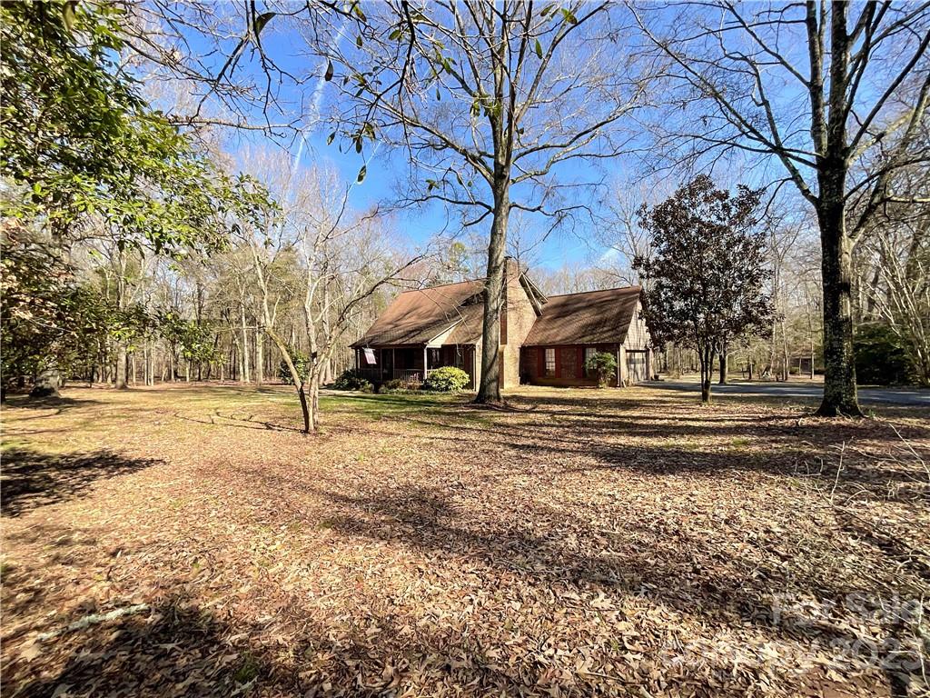 9523 Marvin School Road Marvin, NC 28173 - Photo 40 of 47 a view of road with large trees