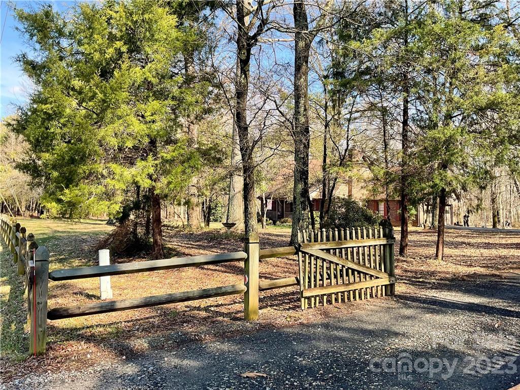 9523 Marvin School Road Marvin, NC 28173 - Photo 4 of 47 a view of a bench in the backyard of a building