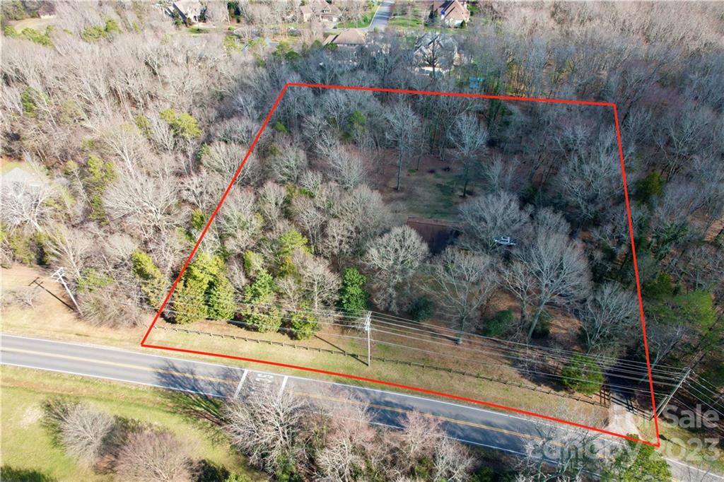 9523 Marvin School Road Marvin, NC 28173 - Photo 45 of 47 a view of a forest with a yard