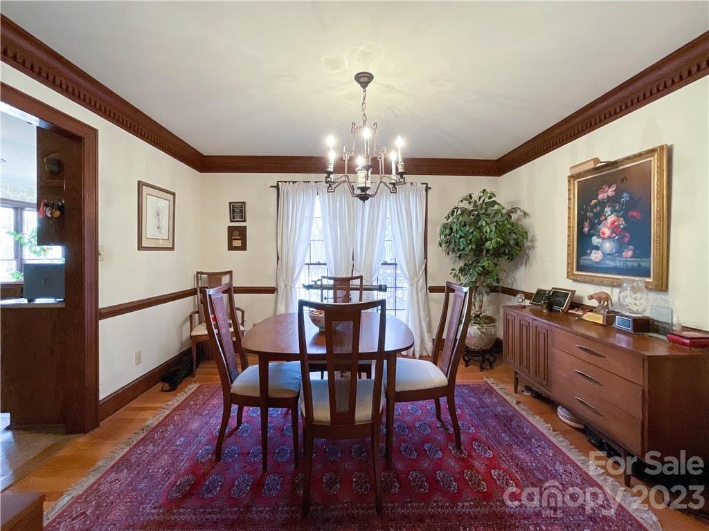 9523 Marvin School Road Marvin, NC 28173 - Photo 8 of 47 a view of a dining room with furniture and wooden floor