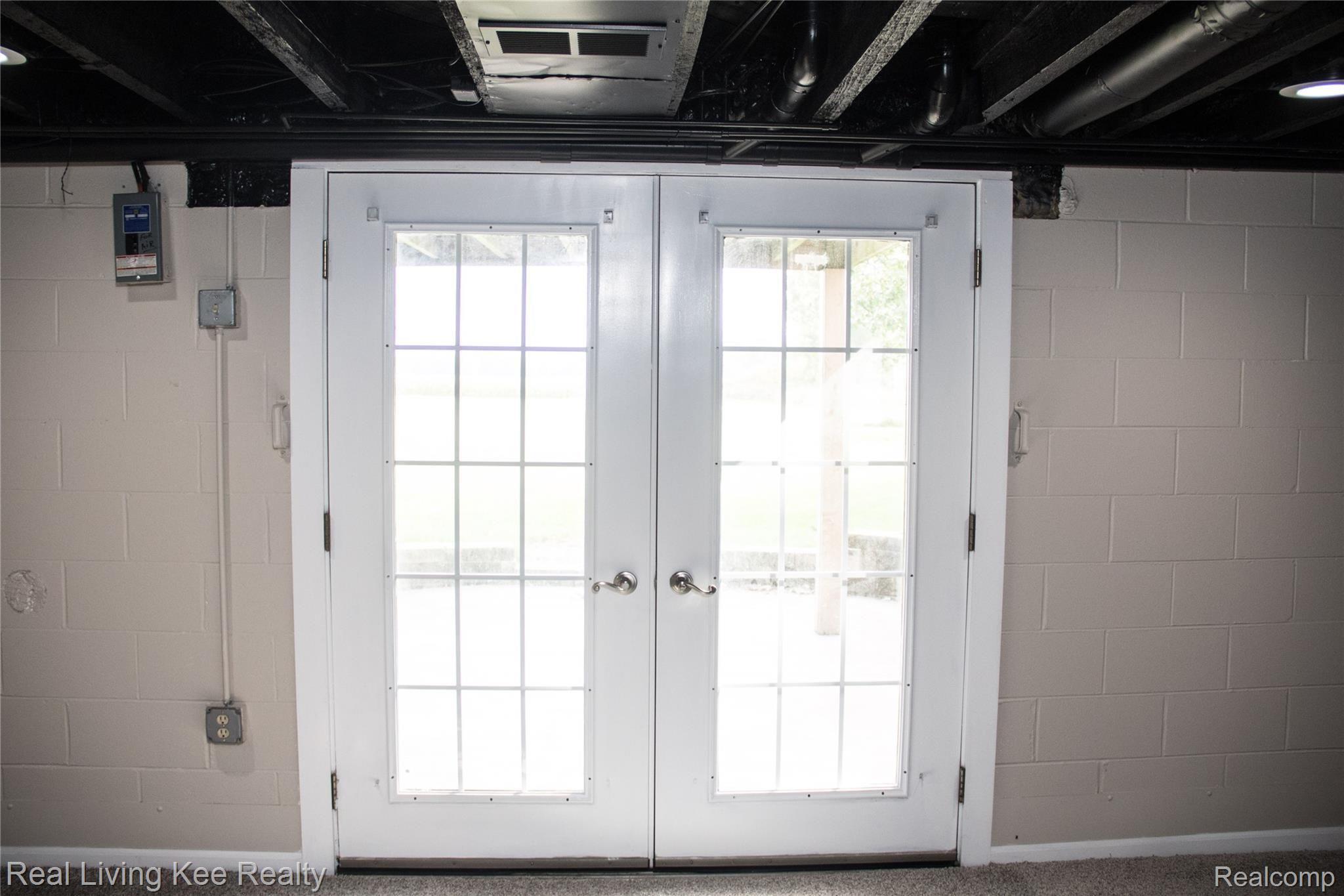 16475 Almont Road Allenton, MI 48002 - Photo 37 of 43 French door walkout.jpg