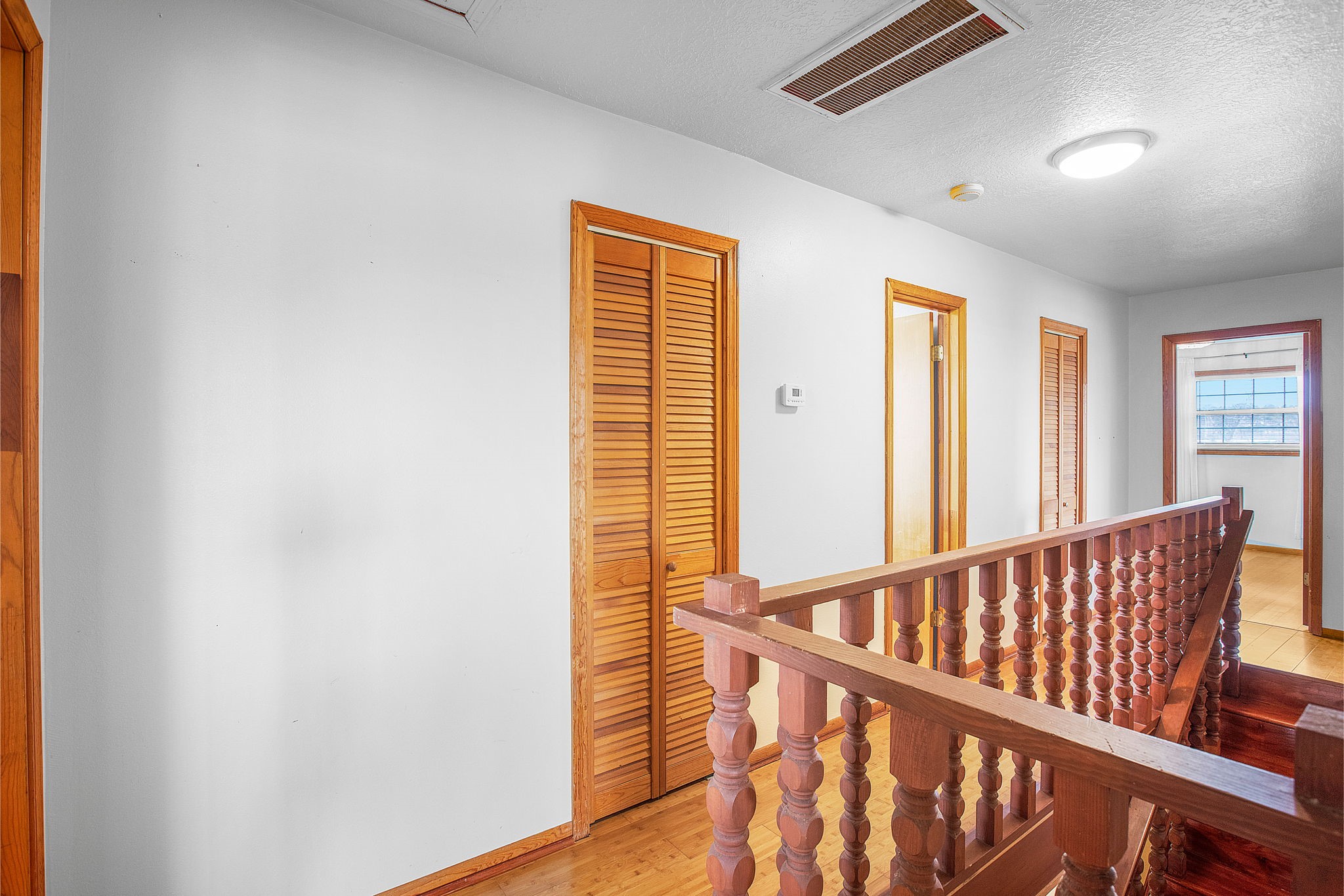 14205 Bohemian Hall Road Crosby, TX 77532 - Photo 18 of 33 a view of staircase with railing and a window