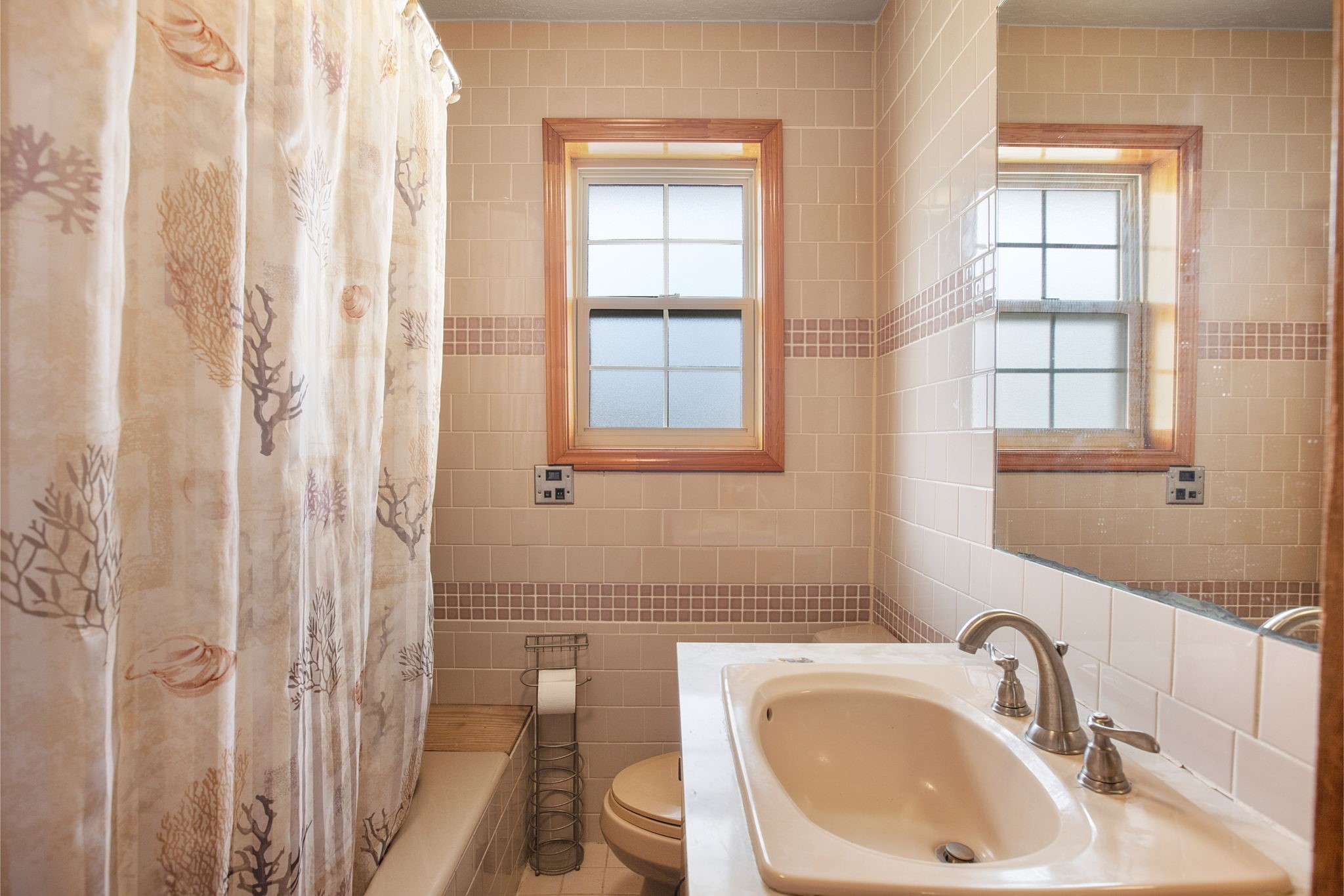 14205 Bohemian Hall Road Crosby, TX 77532 - Photo 21 of 33 a bathroom with a sink a toilet and a window
