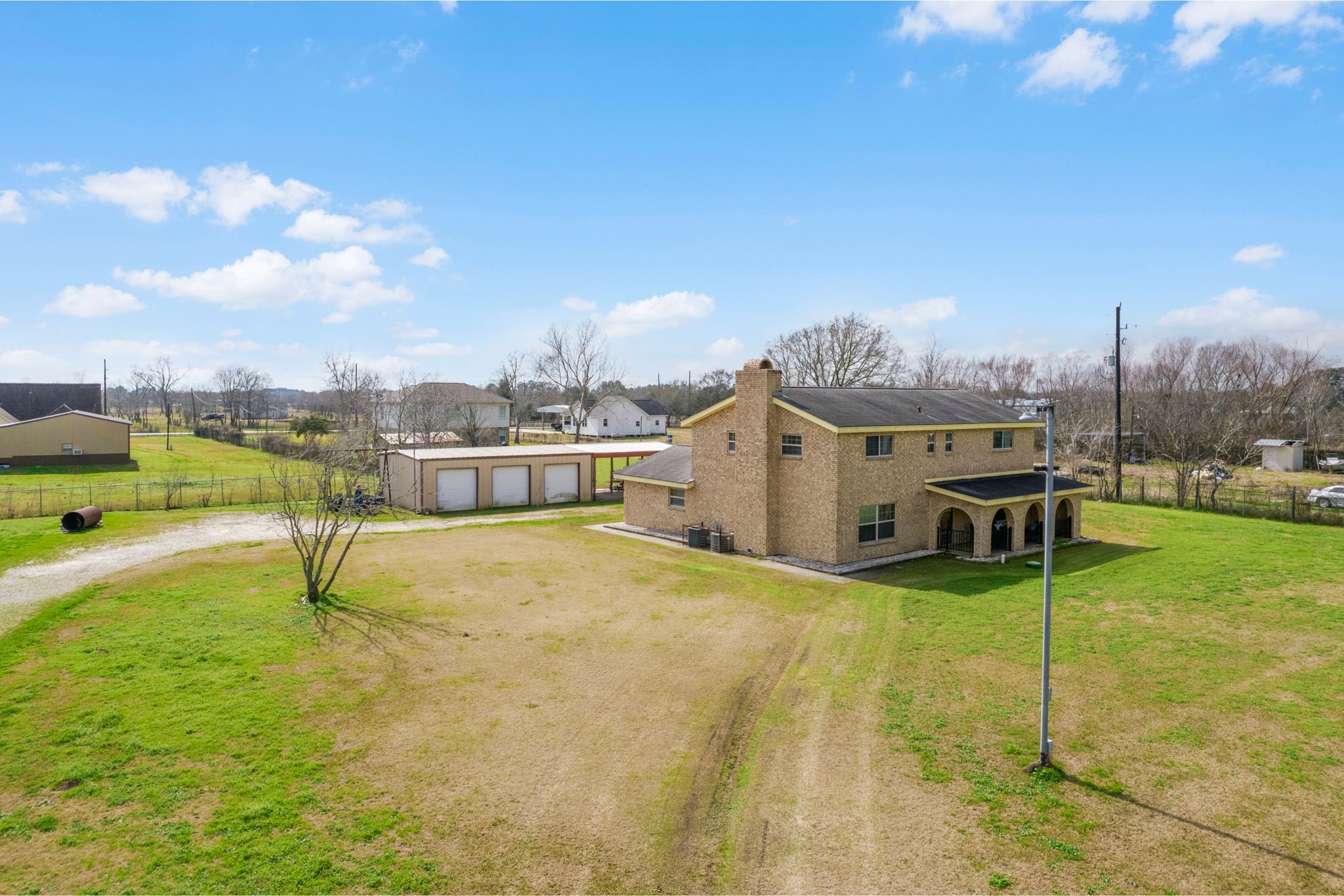 14205 Bohemian Hall Road Crosby, TX 77532 - Photo 30 of 33 a view of a terrace with a garden