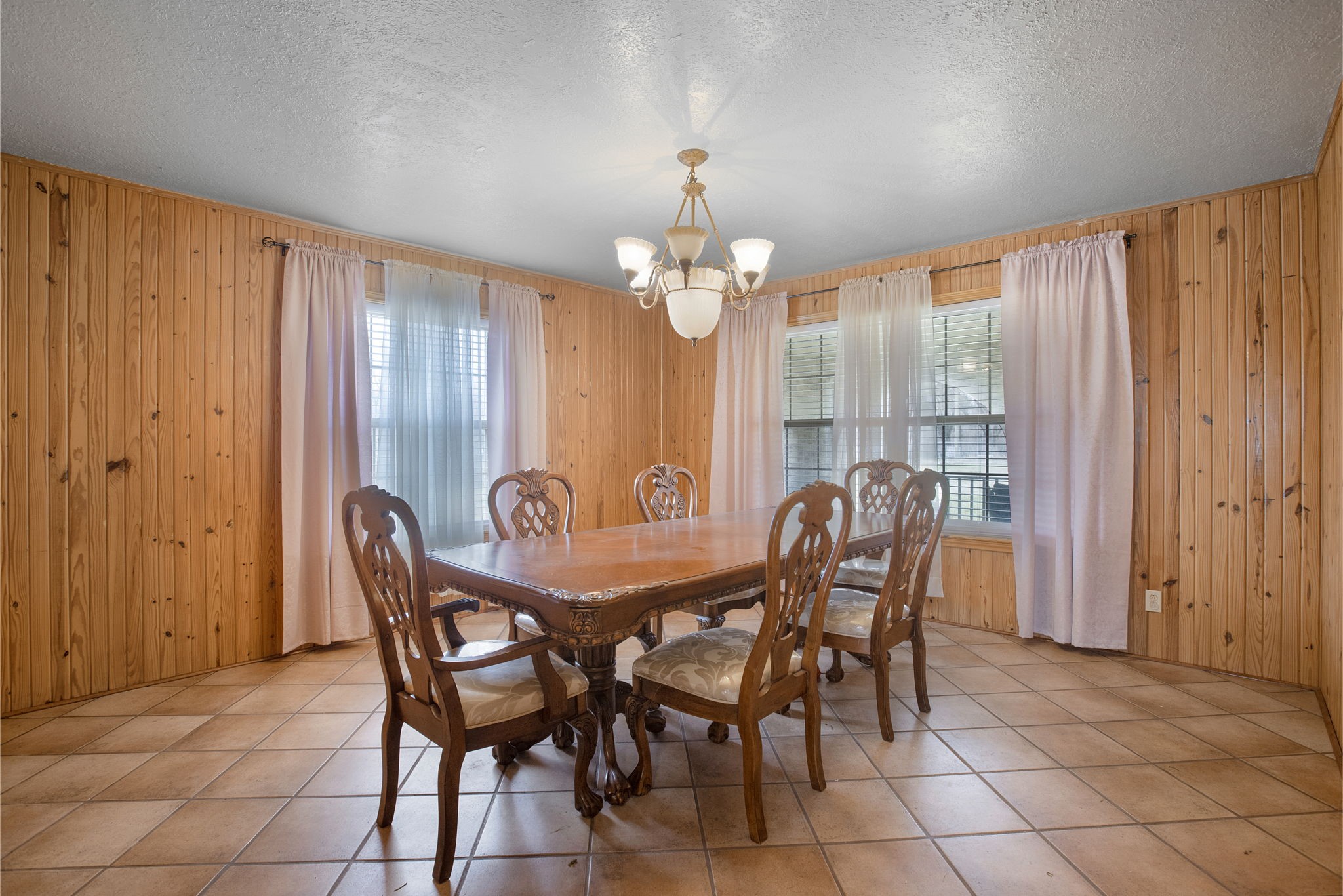 14205 Bohemian Hall Road Crosby, TX 77532 - Photo 7 of 33 a view of a dining room with furniture and chandelier