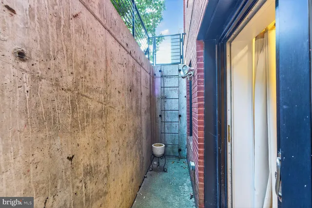 a view of a bathroom with a shower curtain