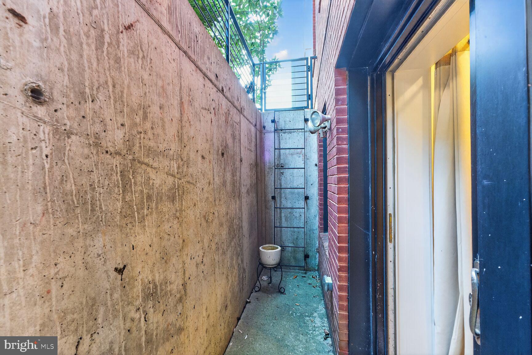 1412 Chapin Street Northwest, Unit 2 Washington, DC 20009 - Photo 15 of 15 a view of a bathroom with a shower curtain