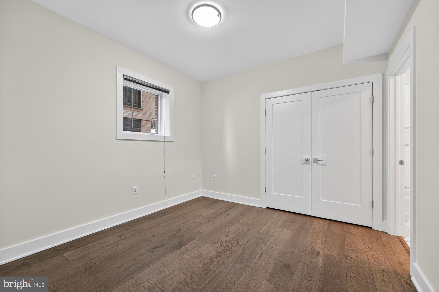 1412 Chapin Street Northwest, Unit 2 Washington, DC 20009 - Photo 10 of 15 a view of a livingroom with wooden floor