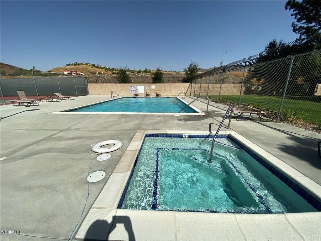 5697 Cochran Street Simi Valley, CA 93063 - Photo 40 of 41 a view of a swimming pool with a terrace