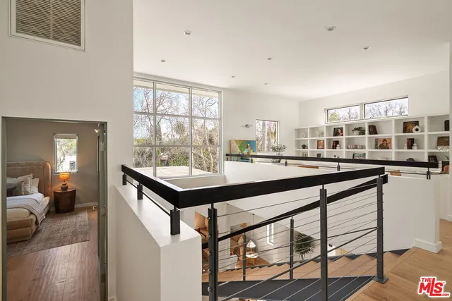 a kitchen with stainless steel appliances kitchen island granite countertop a sink and cabinets