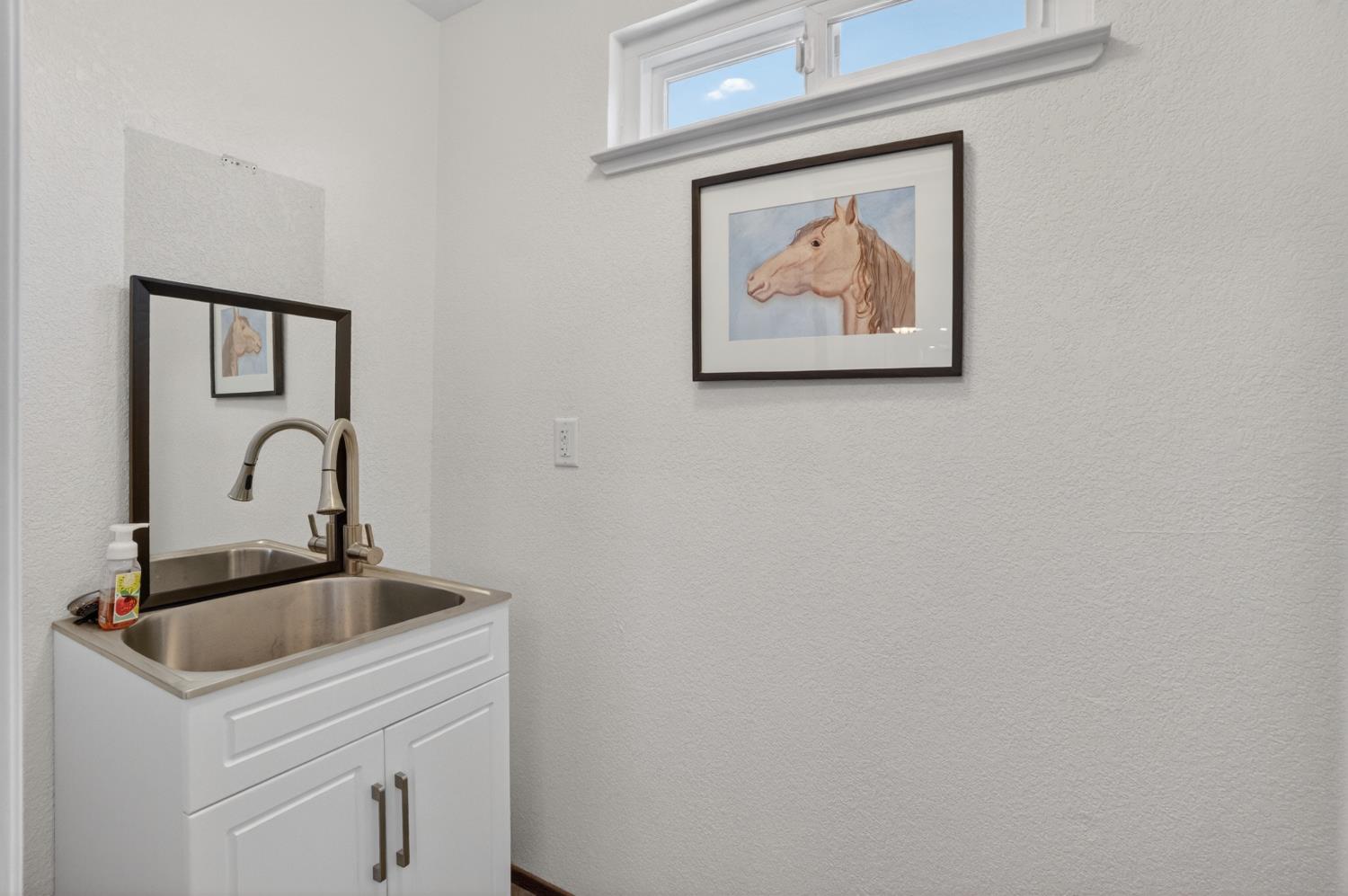 13088 Cherry Road Wilton, CA 95693 - Photo 30 of 58 Half bath off the laundry room.
