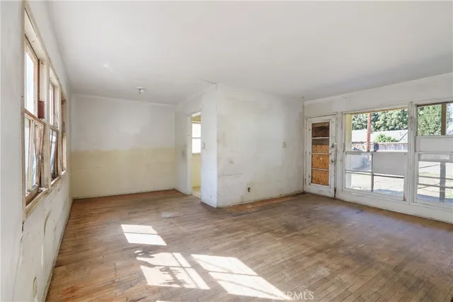 an empty room with windows