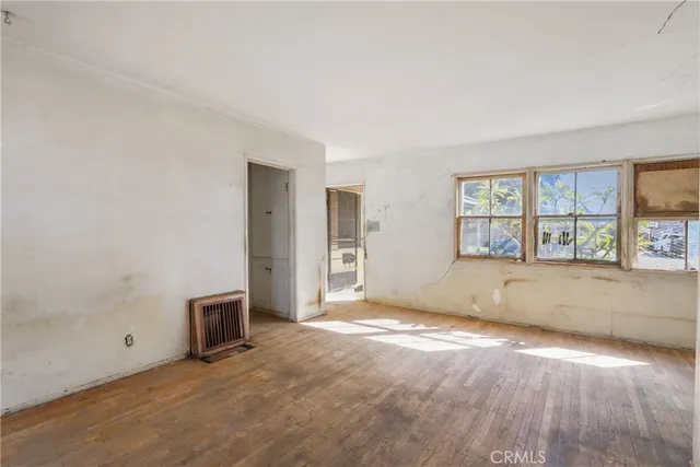 an empty room with windows