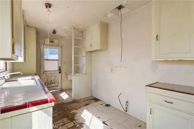 a bathroom with a toilet sink and tub