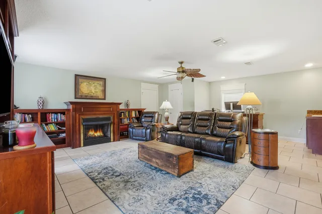 a bed room with a bed and a window