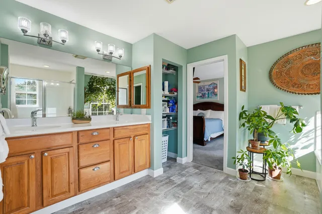 a workspace with a couch and a window