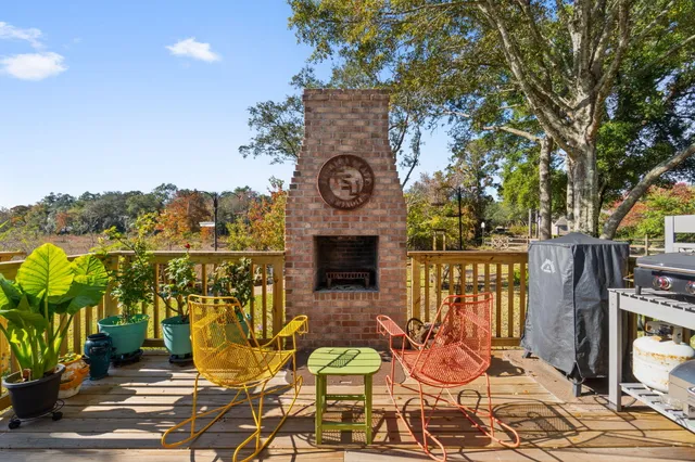 a view of balcony with seating space and trees