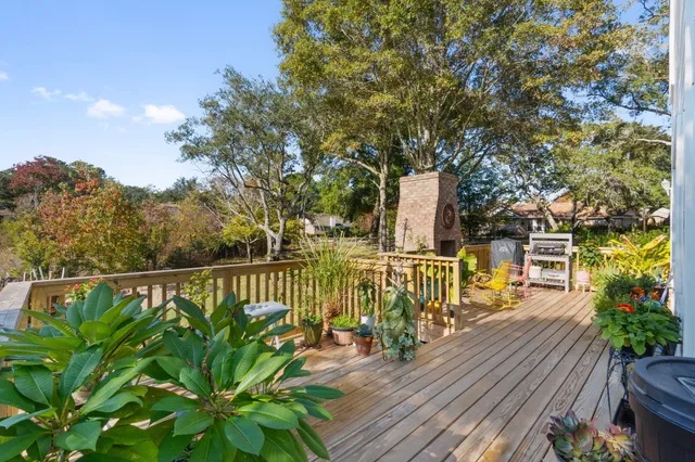 a view of a chairs and table on the deck