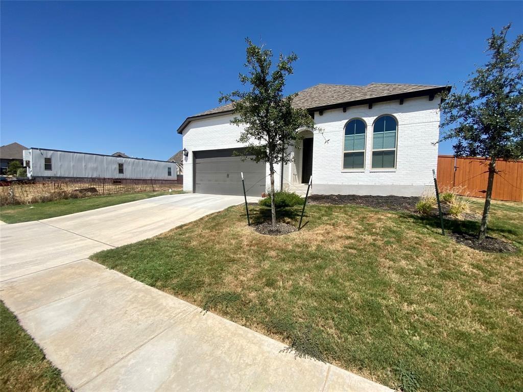a house view with a garden space