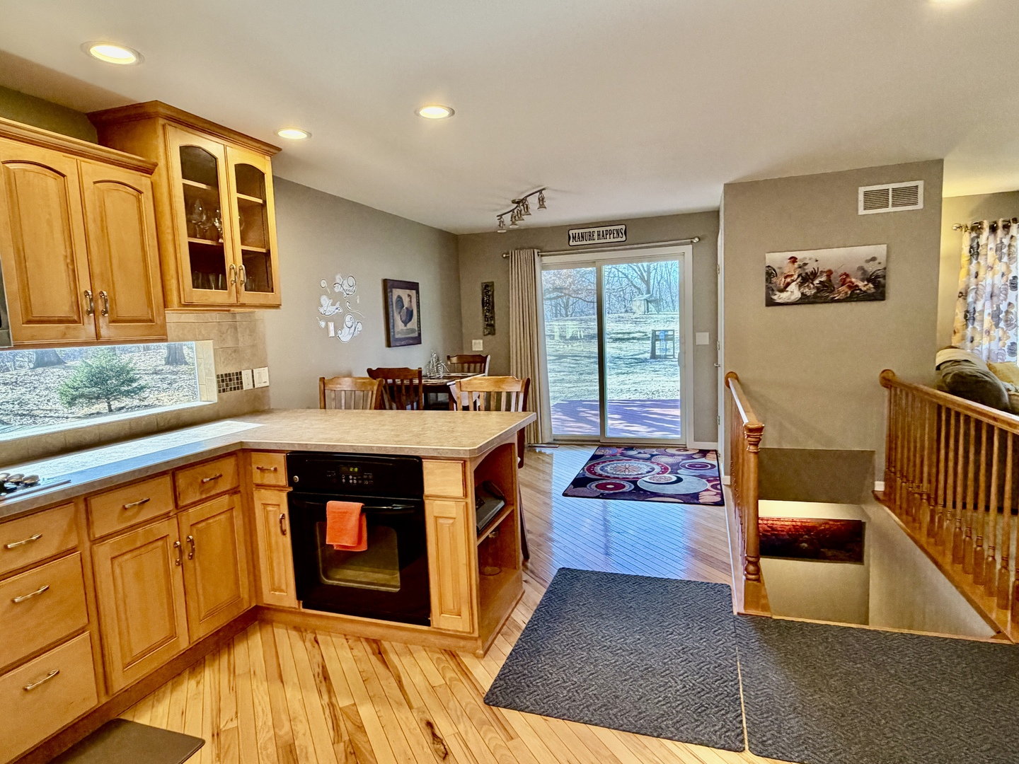 21186 Mathew Road Sterling, IL 61081 - Photo 15 of 66 a kitchen with stainless steel appliances granite countertop a stove a sink and a microwave