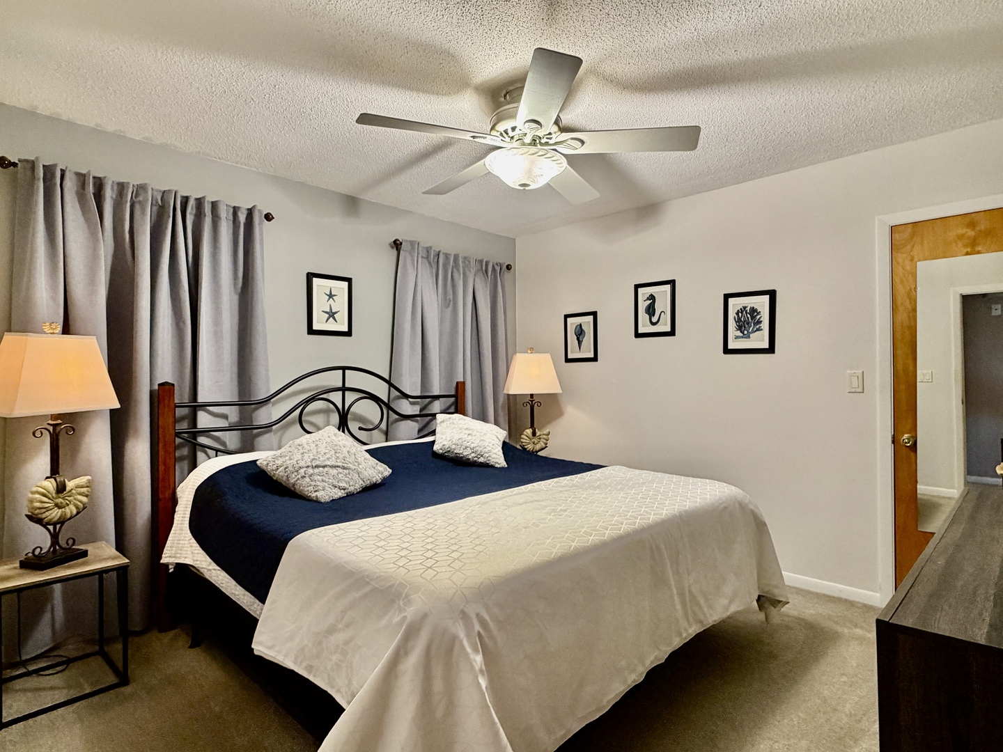 21186 Mathew Road Sterling, IL 61081 - Photo 17 of 66 a bedroom with bed and a chandelier