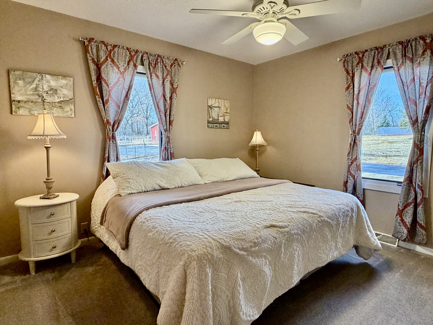 21186 Mathew Road Sterling, IL 61081 - Photo 20 of 66 a bedroom with a bed and a chandelier