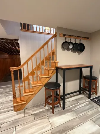 a stove top oven sitting inside of a kitchen