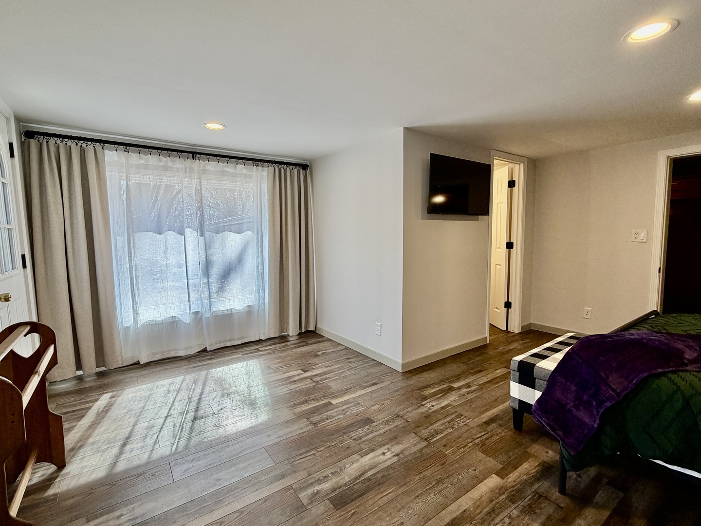 21186 Mathew Road Sterling, IL 61081 - Photo 32 of 66 a view of empty room with wooden floor and fan
