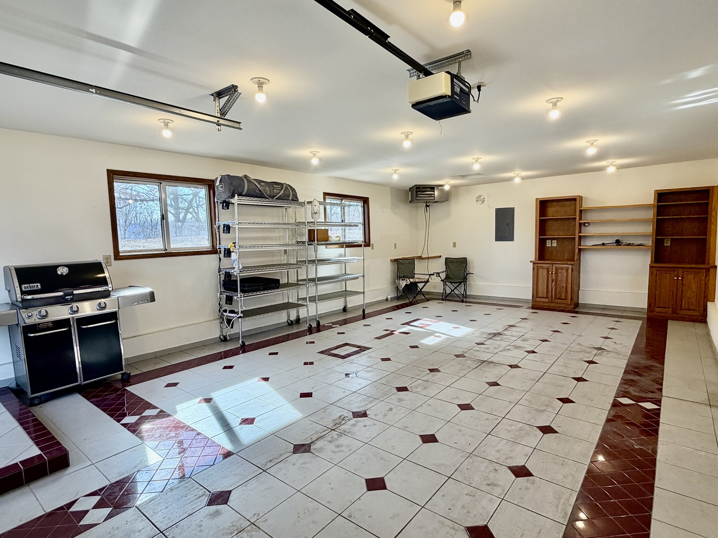 21186 Mathew Road Sterling, IL 61081 - Photo 40 of 66 a kitchen with stainless steel appliances kitchen island granite countertop a refrigerator and a stove top oven