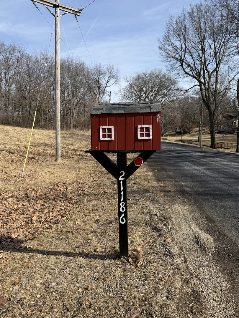 21186 Mathew Road Sterling, IL 61081 - Photo 59 of 66 a sign board on the side of the road