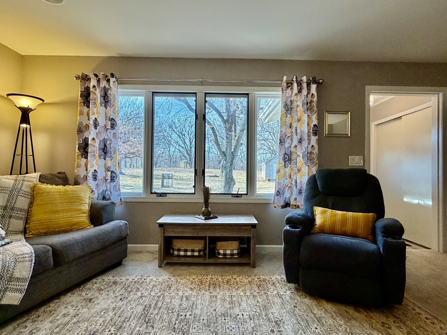 21186 Mathew Road Sterling, IL 61081 - Photo 9 of 66 a living room with furniture and a large window