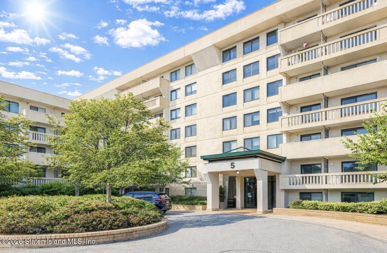 5 Windham Loop, Unit 6E Staten Island, NY 10314 - Photo 1 of 25 a front view of a building