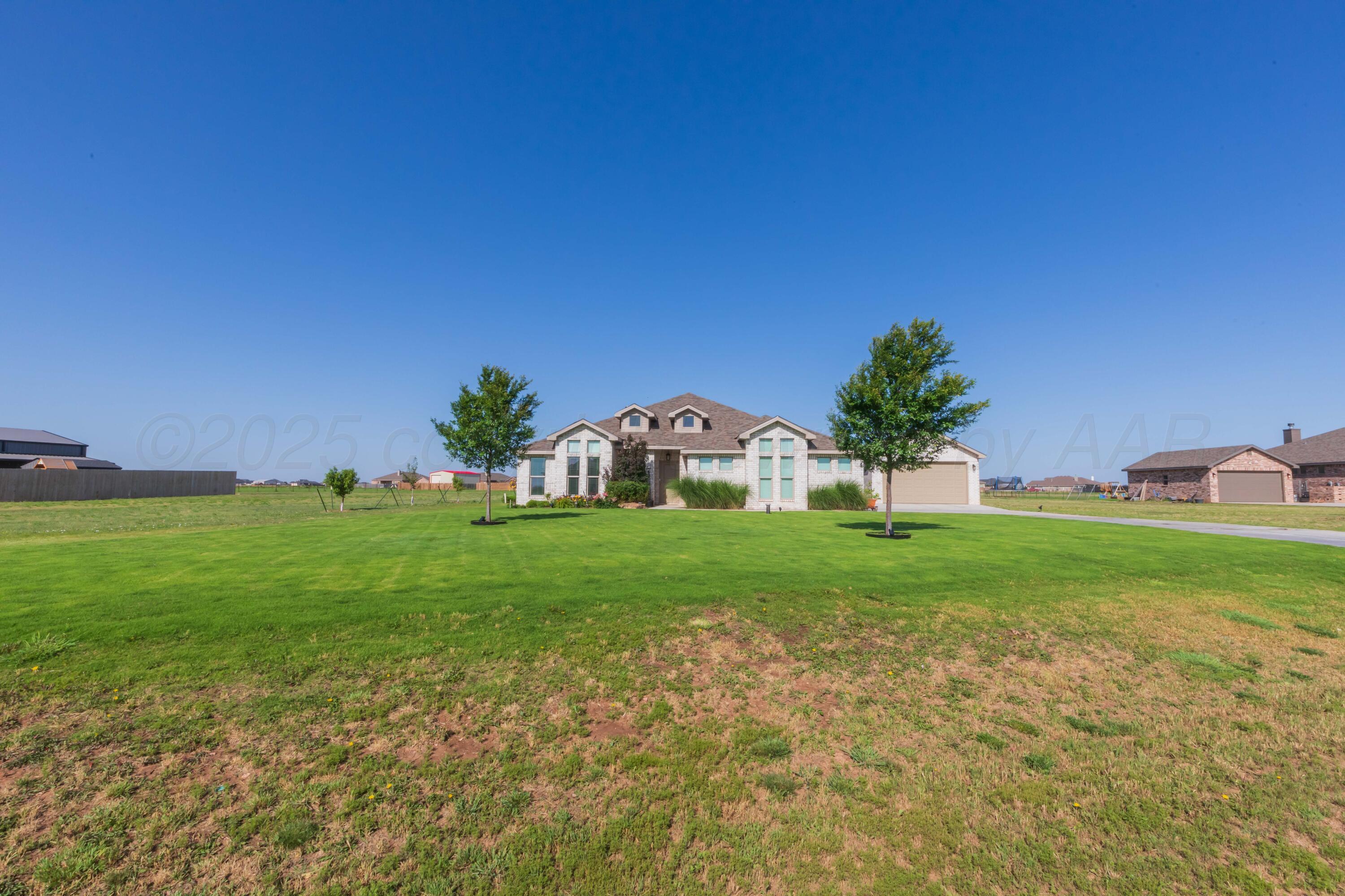 2600 Daybreak Lane Amarillo, TX 79124 - Photo 3 of 52 a view of a garden with a house