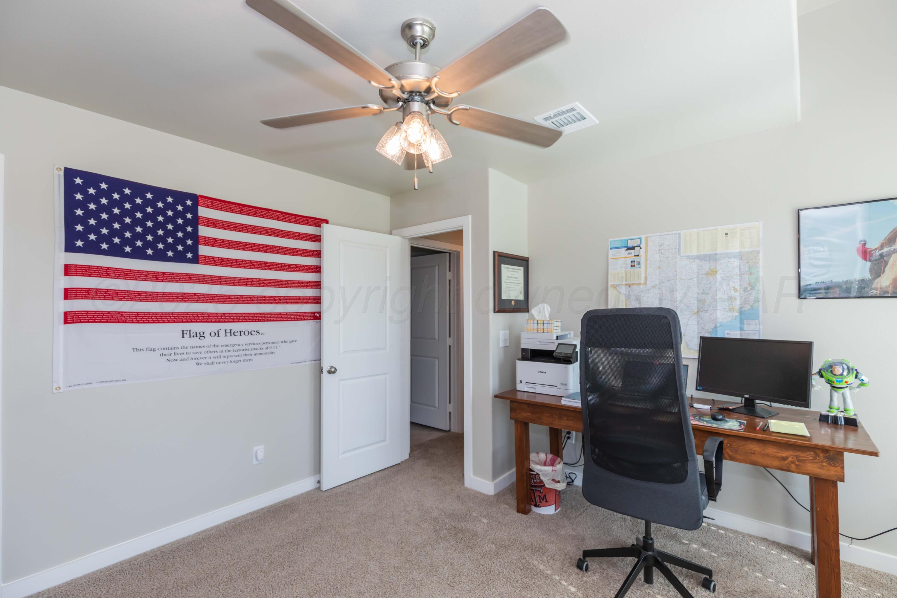 2600 Daybreak Lane Amarillo, TX 79124 - Photo 43 of 52 a view of a workspace with furniture and a window